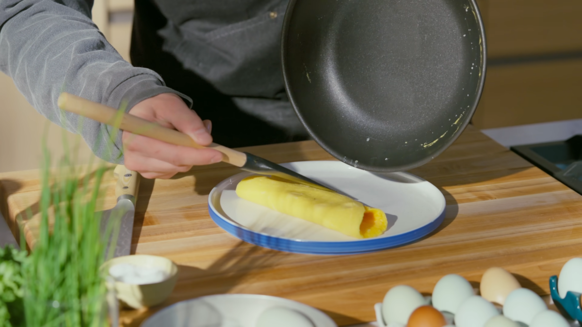 An omelette served on a white plate.