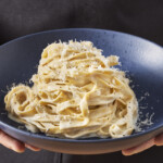 A bowl of homemade fettuccine alfredo.