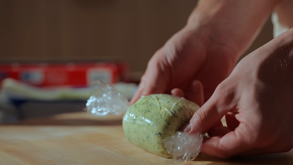 Compound butter rolled in plastic wrap.