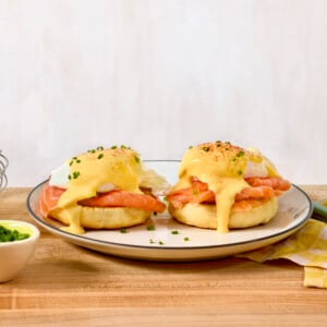 Eggs Benedict with salmon on a plate.