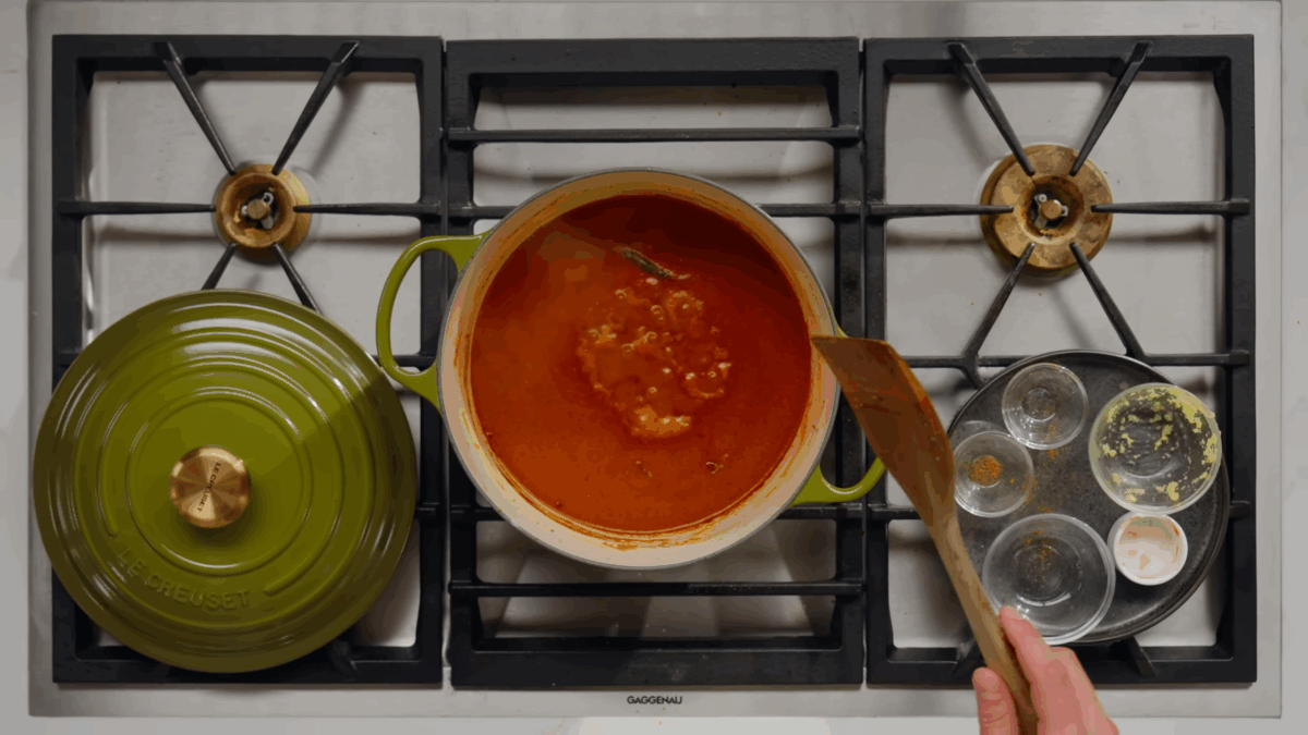 Butter chicken sauce simmering on the stove.