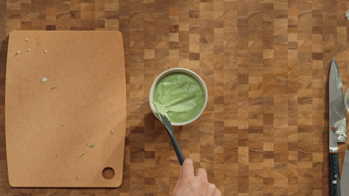 Cilantro avocado dipping sauce in a bowl. 