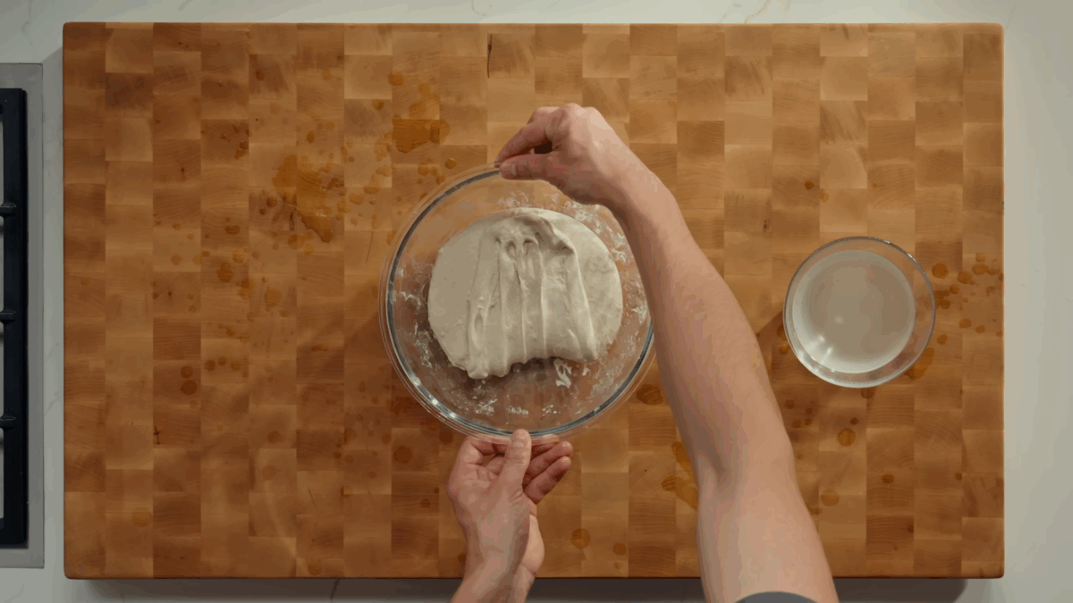 Nick DiGiovanni folding sourdough bread dough.
