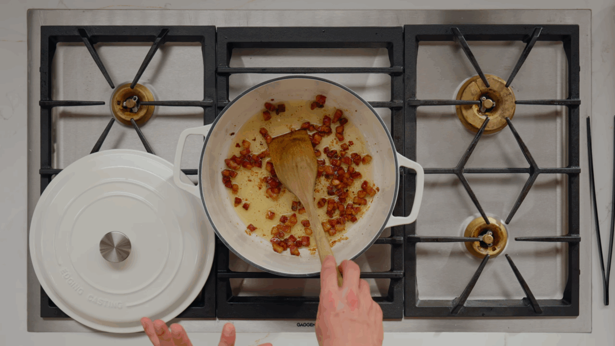 Nick DiGiovanni rendering pancetta in a Dutch oven.