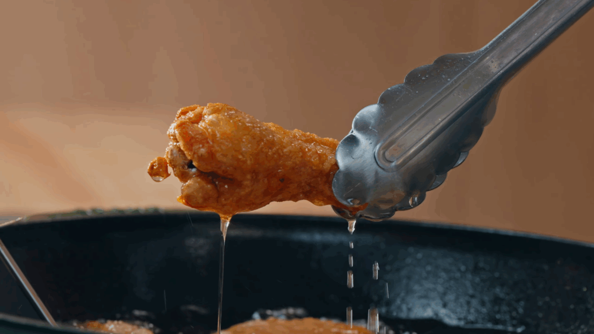 Nick DiGiovanni double frying chicken wings.