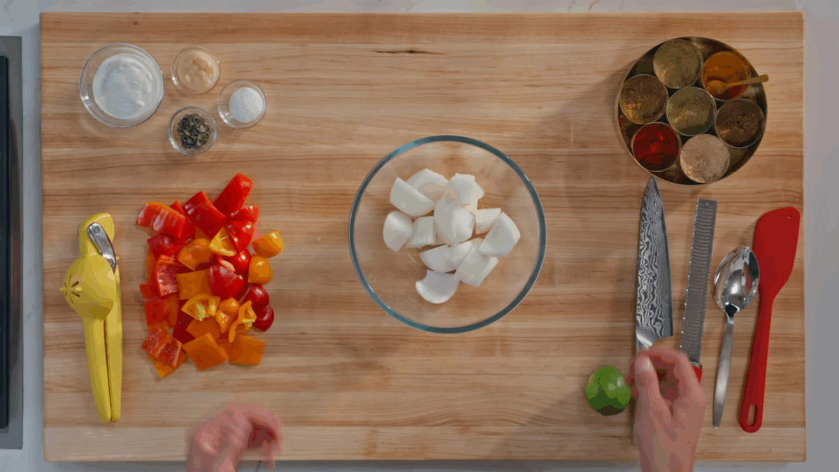 Nick DiGiovanni combining ingredients for chicken tikka masala marinade.