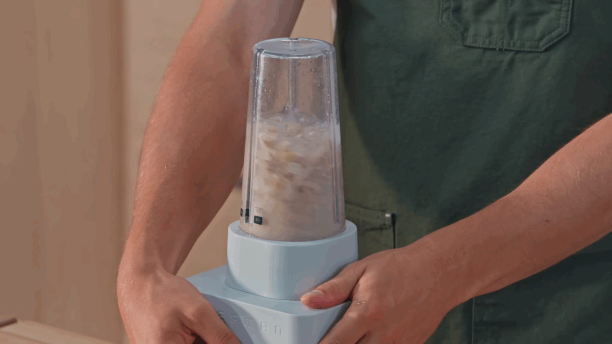 Nick DiGiovanni blending soaked cashews.