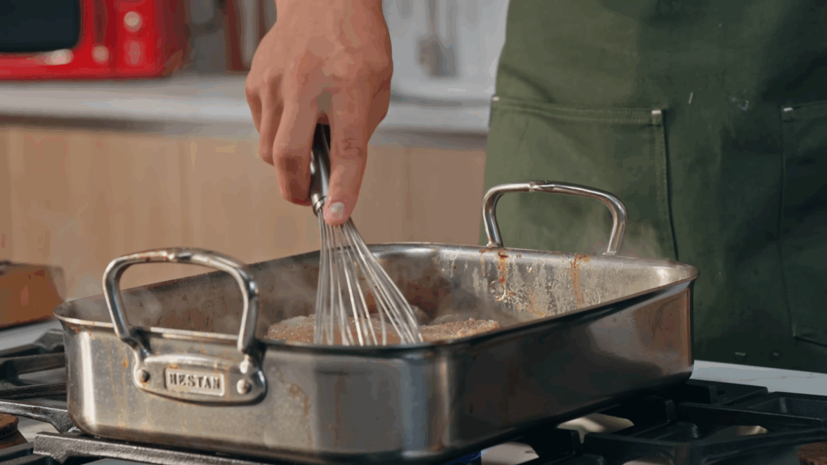 Nick DiGiovanni whisking turkey gravy. 