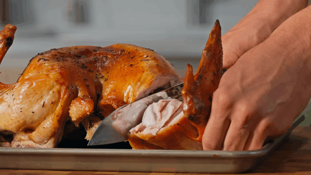 Nick DiGiovanni carving a Thanksgiving turkey. 