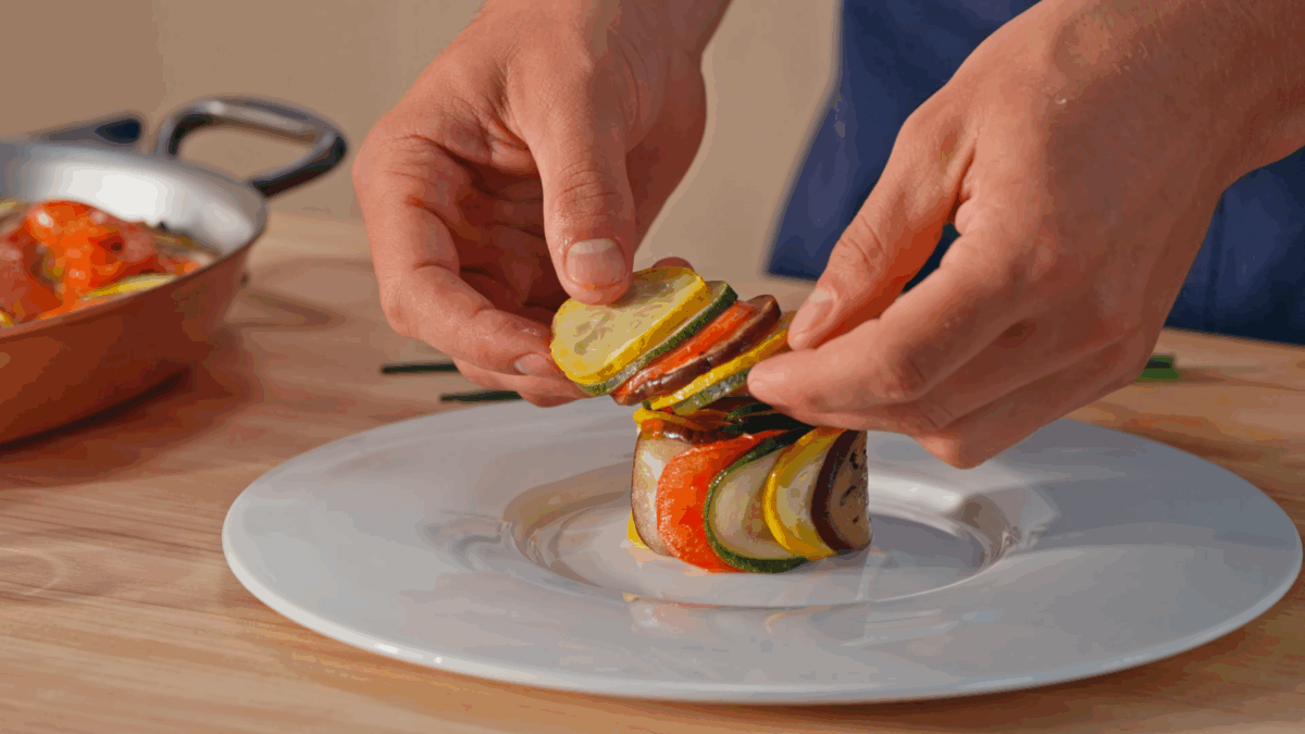 Nick DiGiovanni plating ratatouille.