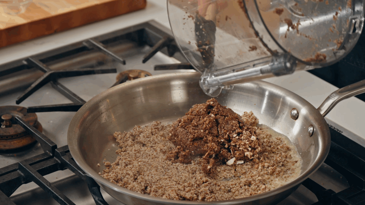 Nick DiGiovanni cooking a mushroom mixture for Beef Wellington. 
