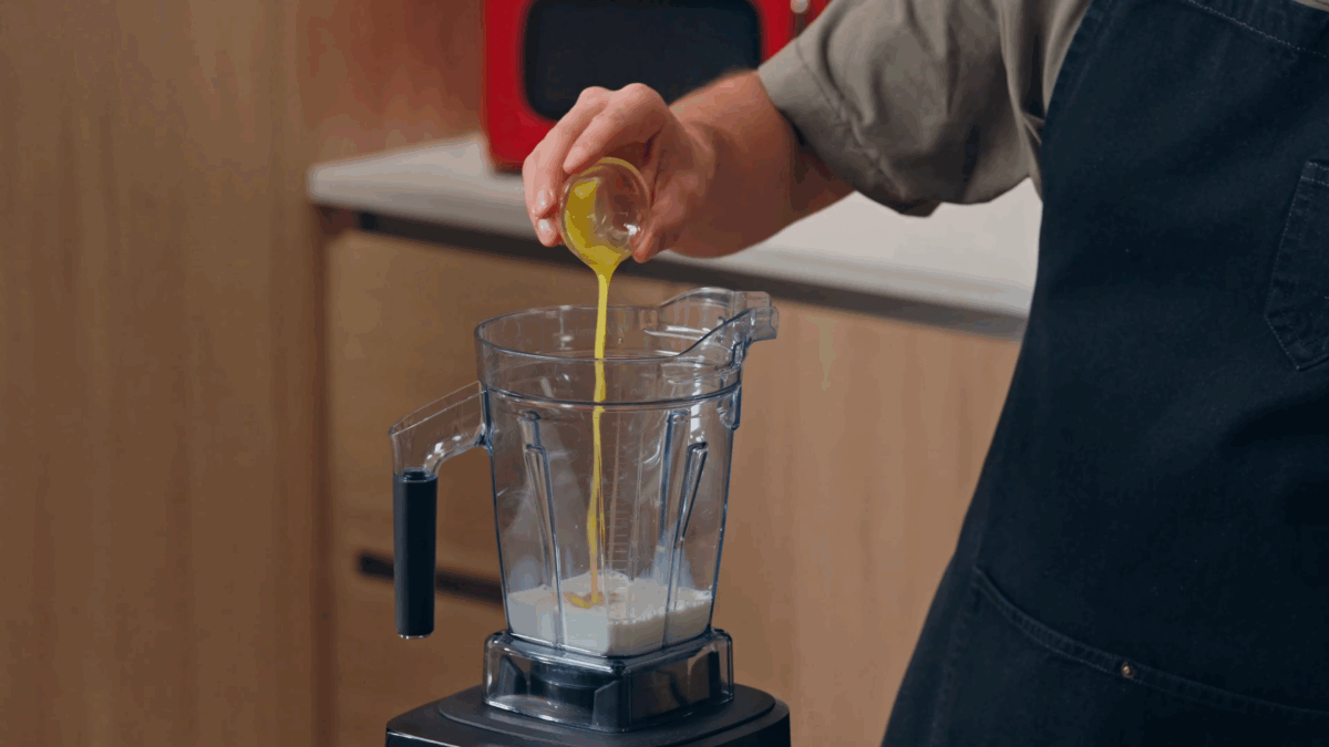 Nick DiGiovanni combining cr&ecirc;pe batter ingredients in a blender. 