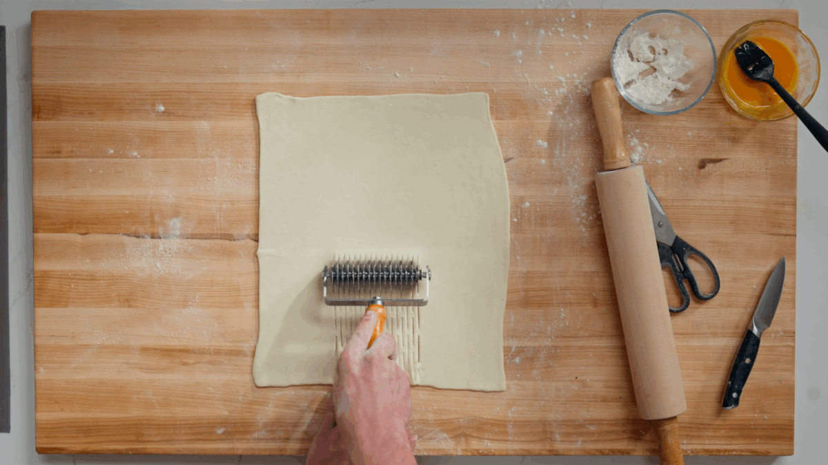 Nick DiGiovanni rolling out lattice dough. 
