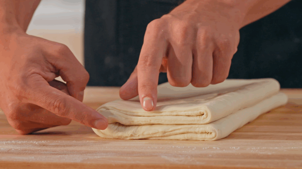 Nick DiGiovanni making a letter fold with homemade croissant dough. 