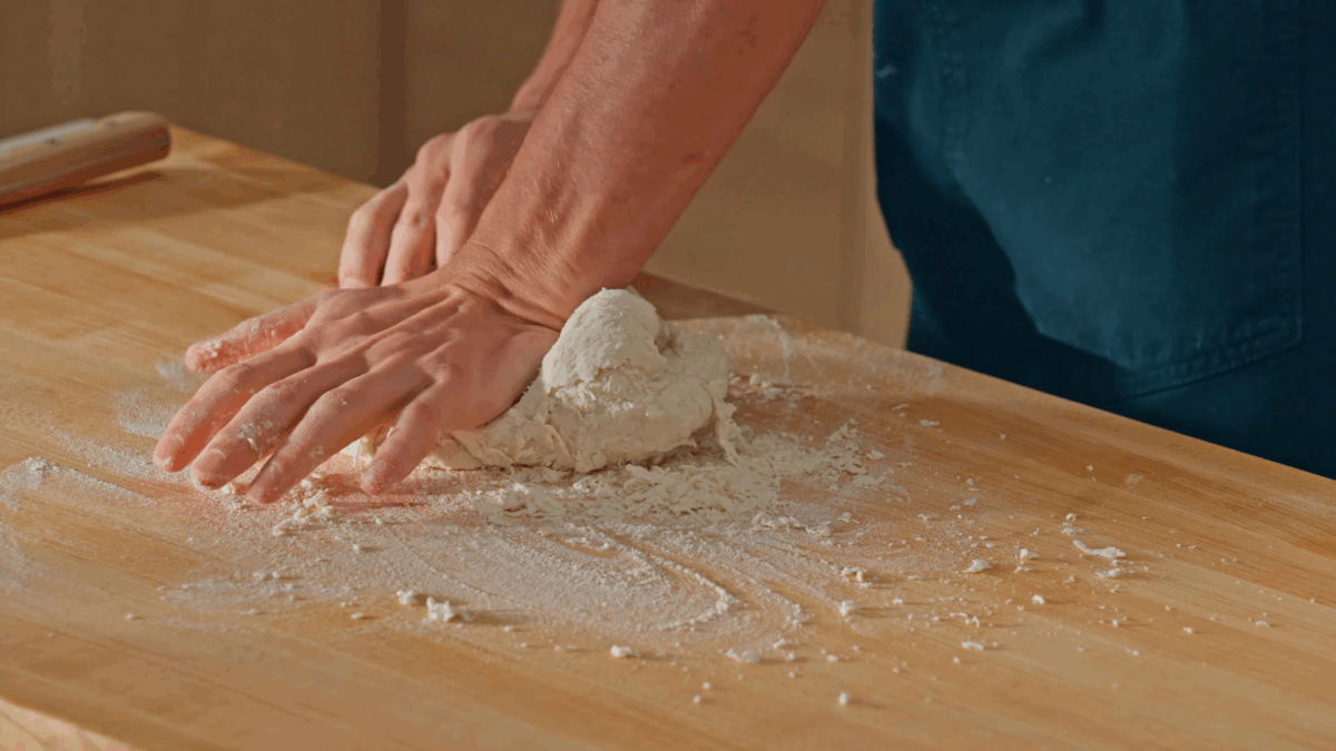 Nick DiGiovanni kneading ramen noodle dough. 
