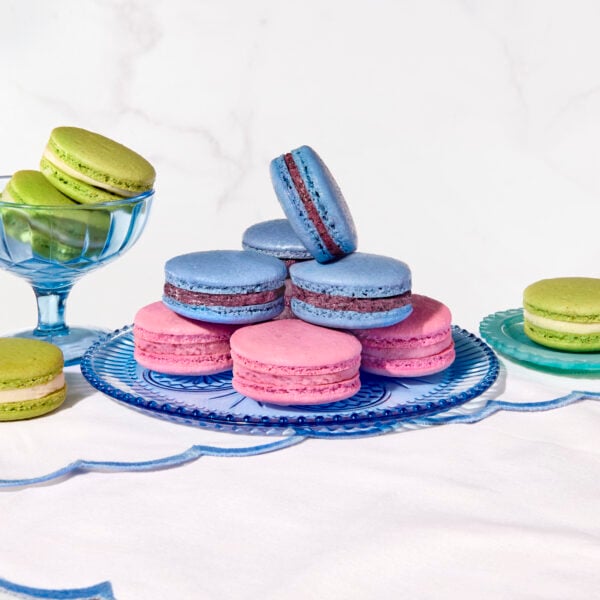 Pistachio, raspberry, and blueberry French macarons.