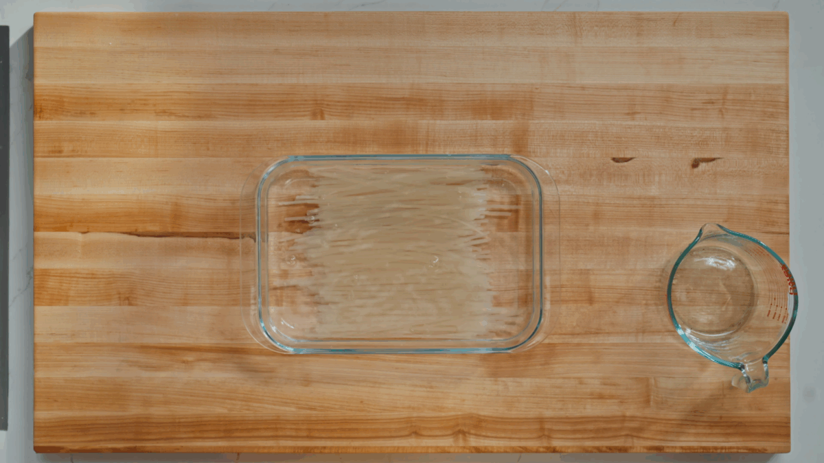 Rice noodles soaking in water.