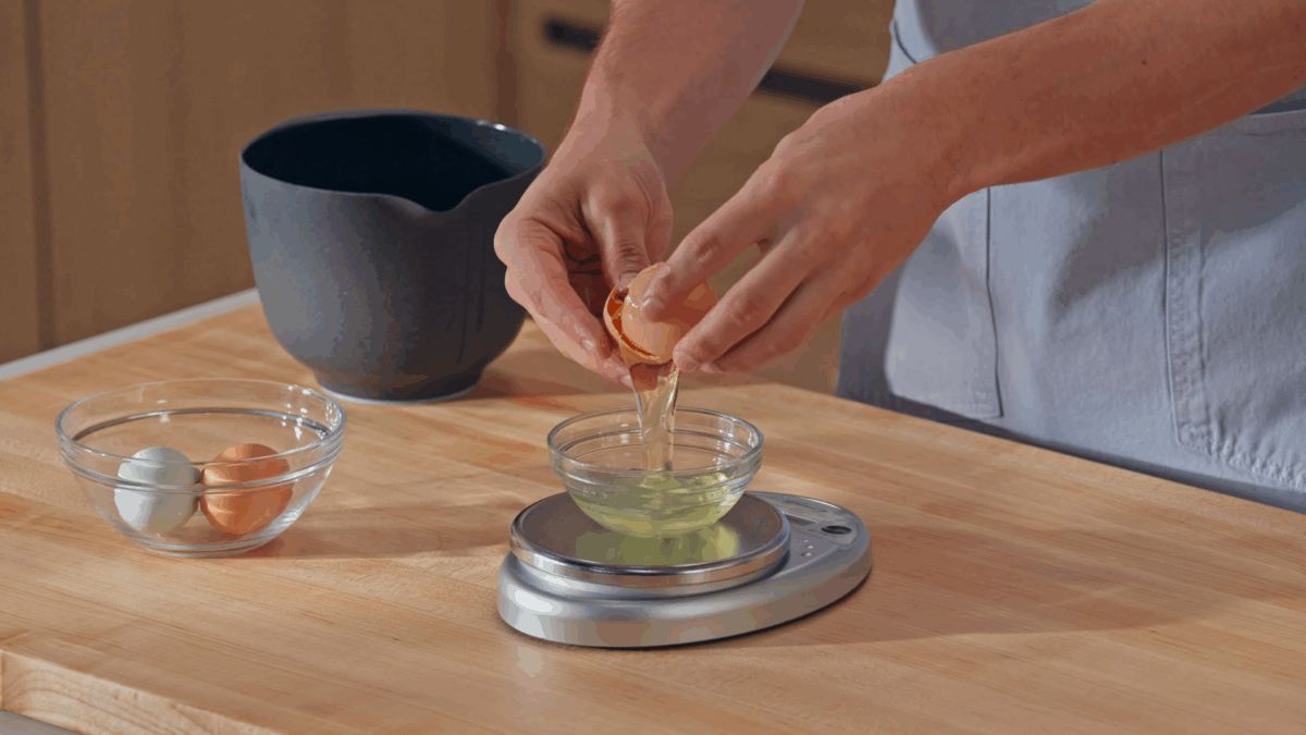 Nick DiGiovanni separating egg whites and yolks. 
