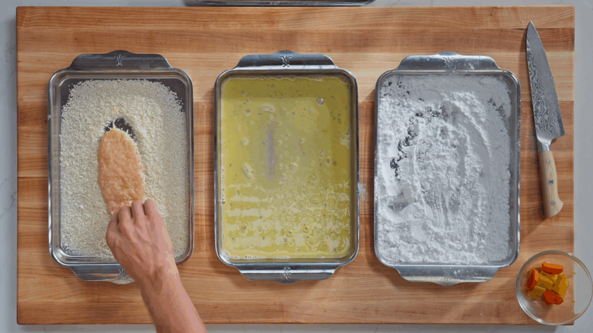 Nick DiGiovanni breading katsu chicken.