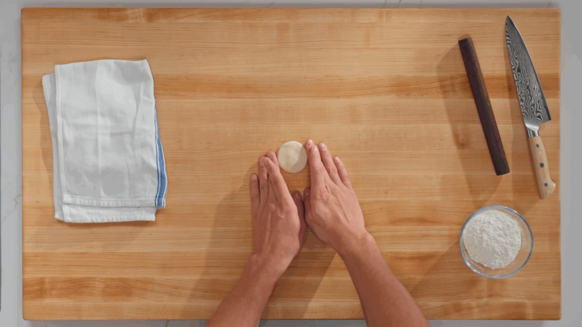Nick DiGiovanni shaping dumpling dough. 