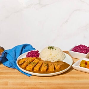 A plate of chicken katsu curry.