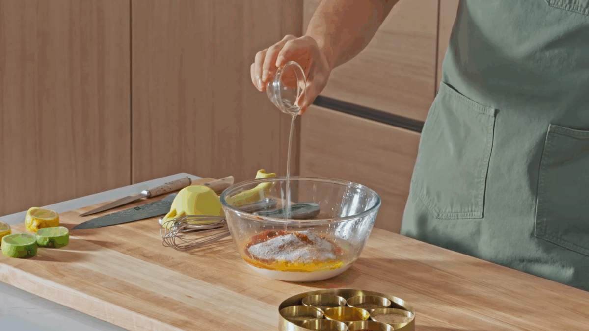 Nick DiGiovanni combining tandoori marinade ingredients in a bowl. 