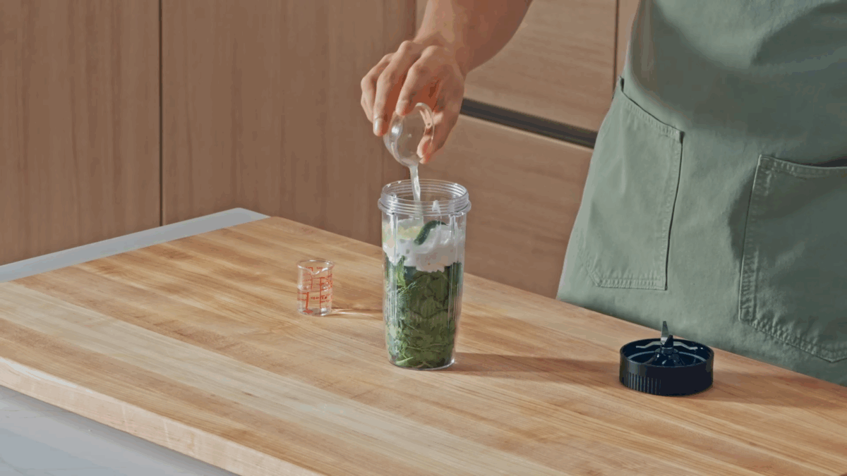 Nick DiGiovanni combining mint-coriander chutney ingredients in a blender. 