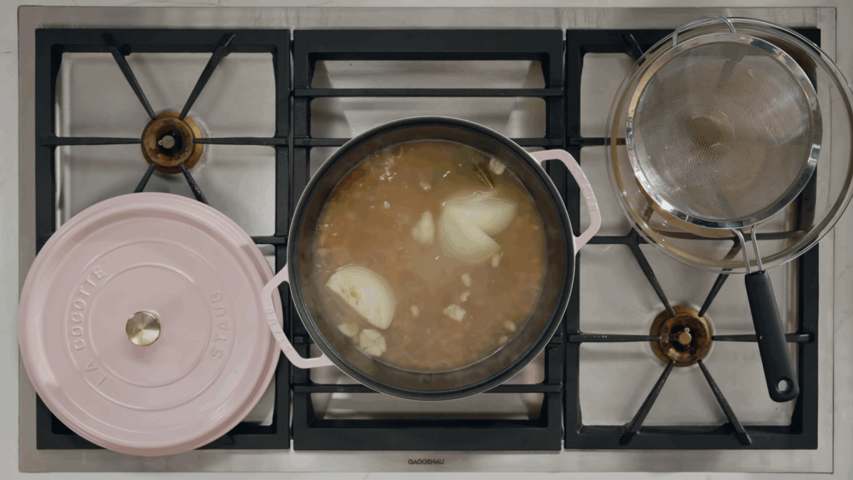 Pinto beans cooking in a Dutch oven. 