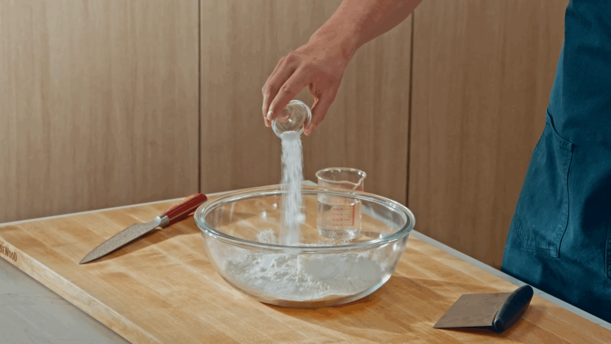 Nick DiGiovanni combining tortilla ingredients in a bowl. 