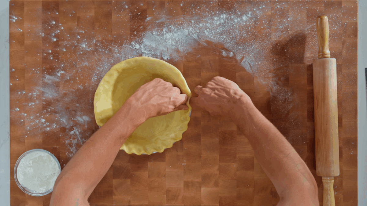 Nick DiGiovanni crimping pie dough for lemon meringue pie.
