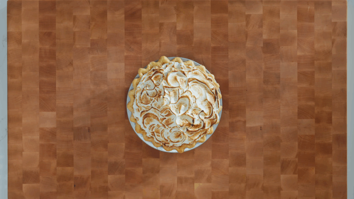 A lemon meringue pie with a toasted topping.