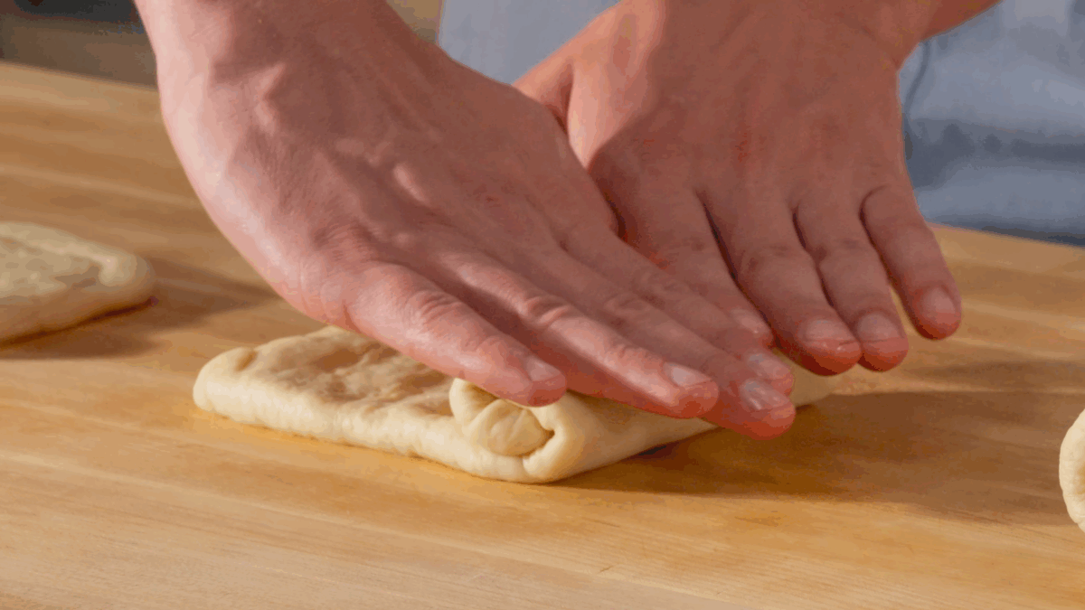 Nick DiGiovanni shaping shokupan dough. 