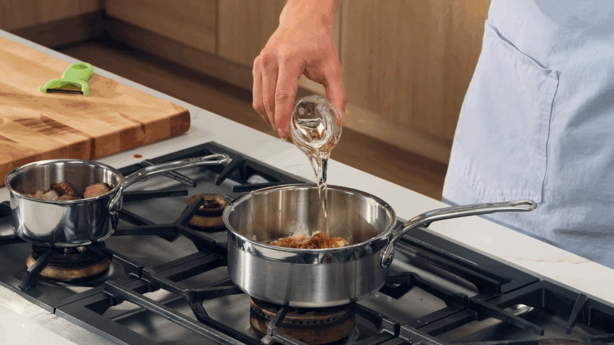 Nick DiGiovanni combining tonkatsu sauce ingredients in a saucepan. 