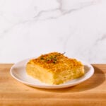 A serving of potato gratin on a plate.
