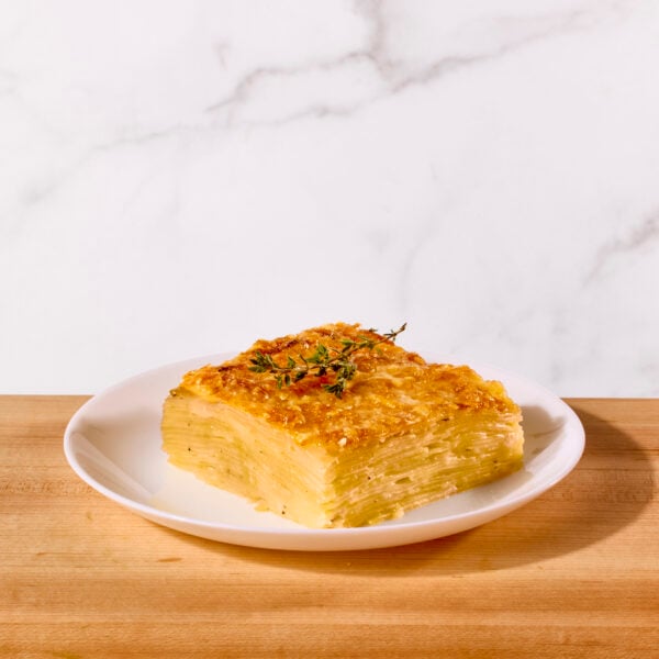 A serving of potato gratin on a plate.