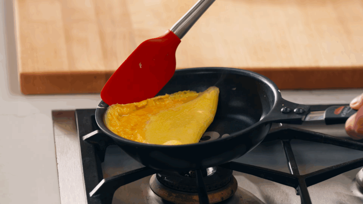 Nick DiGiovanni flipping a Japanese omelet. 